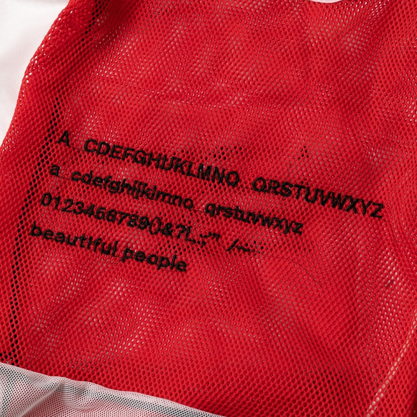 alphabet embroidely marche flip bag