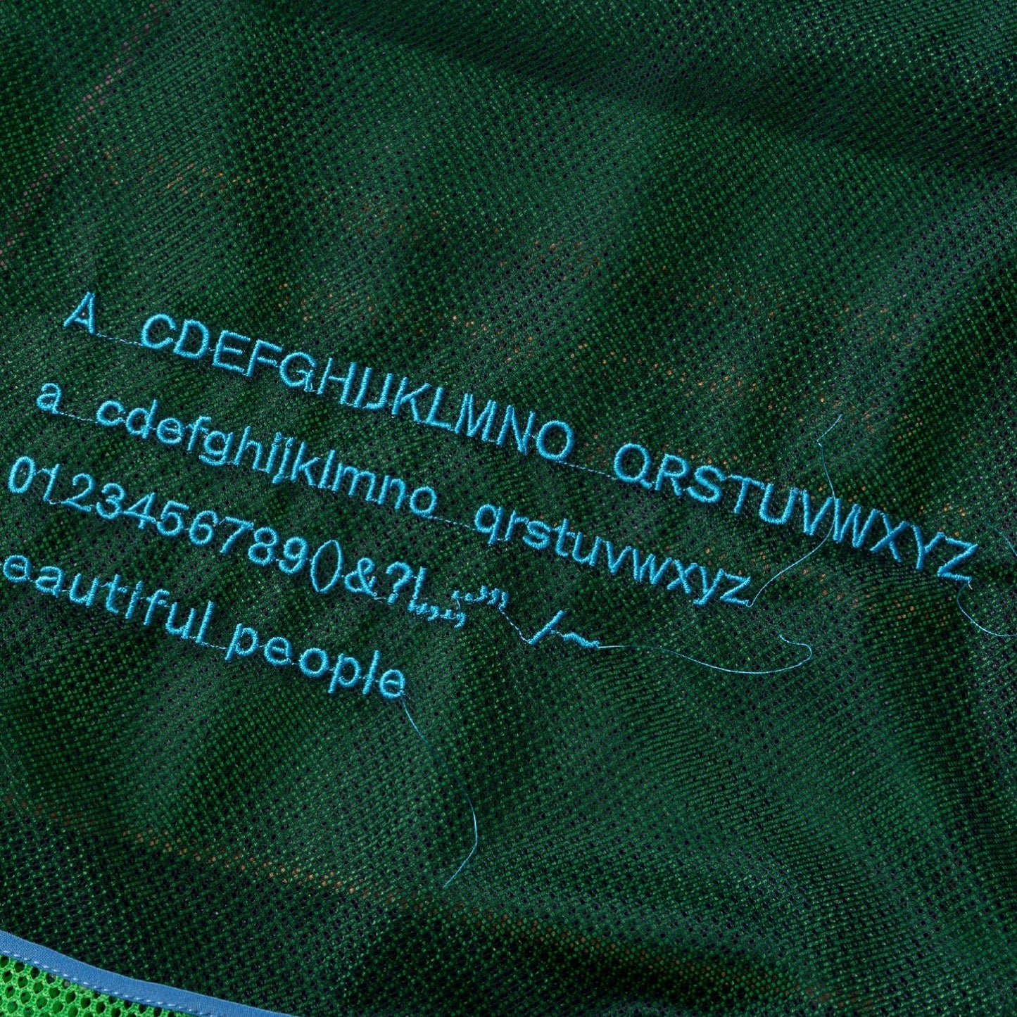 alphabet embroidely marche flip bag