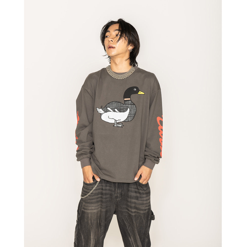 TURBO DUCK L/S TEE 10/25 (mae likely refers to a date or time, possibly "before" or "ago")