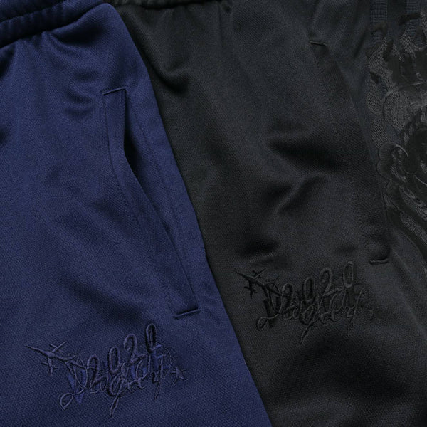 CHAOS EMBROIDERY TRACK PANTS