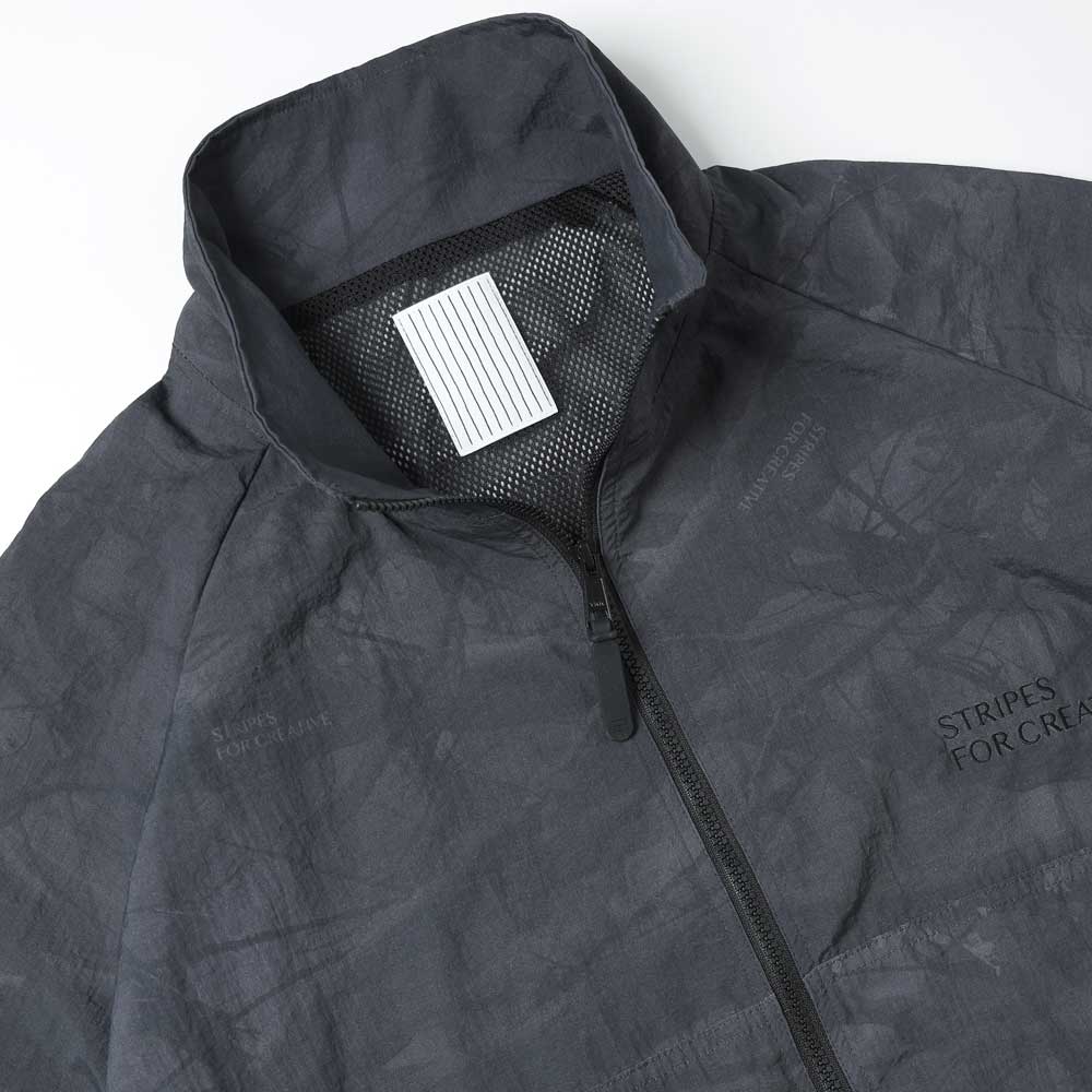 SFC (Stripes for Creative) WINDBREAKER JACKET (REAL TREE CAMO