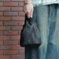 CCU LEATHER KINCHAKU BAG