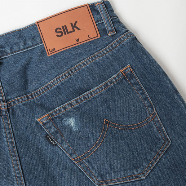 DAMAGED SILK DENIM PANTS